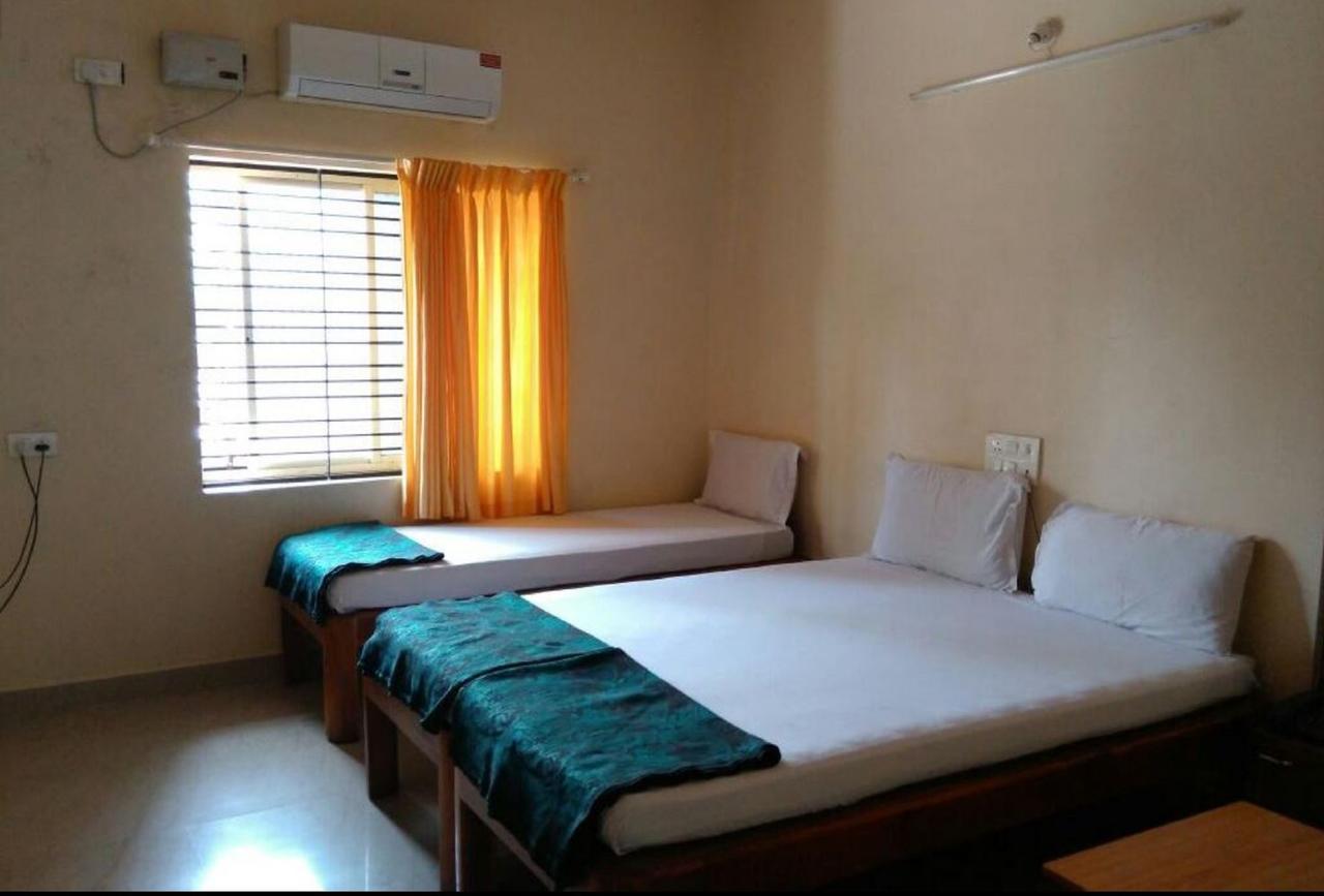 Dhenu Atithya Hotel Mavalli Exterior photo