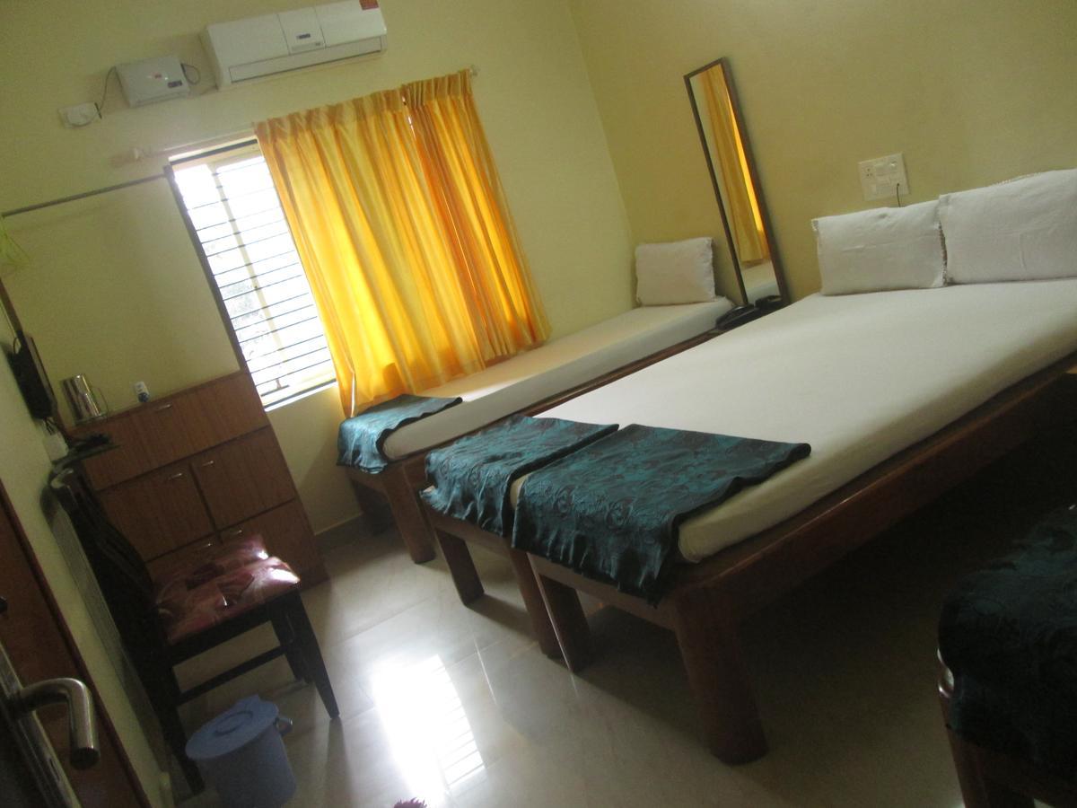 Dhenu Atithya Hotel Mavalli Exterior photo