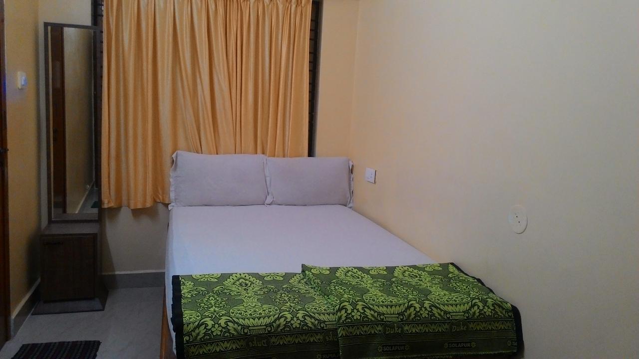 Dhenu Atithya Hotel Mavalli Exterior photo